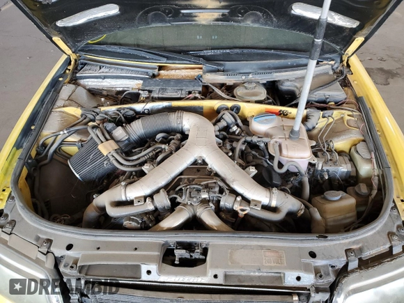 2000 Audi S4 z VIN WAUDD68D1YA107657, wystawiony jako Copart lot #81312104 z przebiegiem 133 371 mil mil oraz Czysty tytuł • Clean title. Historia ofert i sprzedaży dostępna na DreamBid. Obrazek 11.