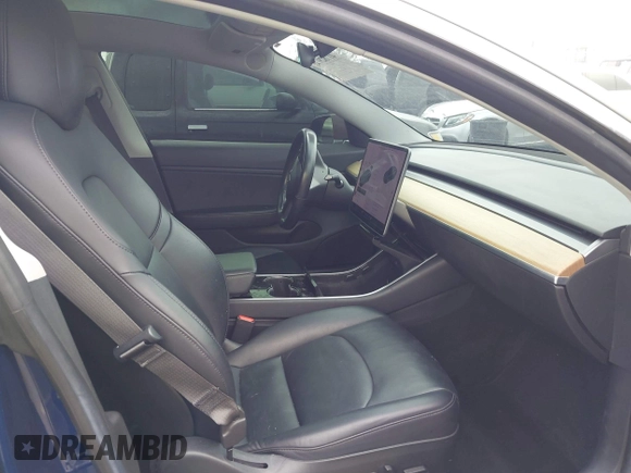 2018 Tesla Model 3 Long Range Battery with VIN 5YJ3E1EA7JF012249, listed as a IAAI auction lot 41782972 with 103,412 mi miles. Bid and sale history available at carsss.com. Image 5.
