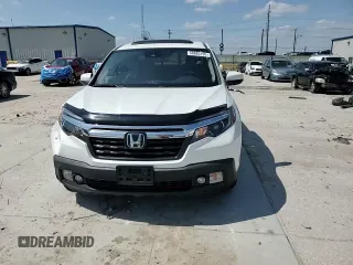 2020 Honda Ridgeline RTL with VIN 5FPYK3F57LB031244, listed as a Copart auction lot 58863795 with 54,318 mi miles and Salvage title. Bid and sale history available at DreamBid. Image 14.