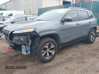 2014 Jeep Cherokee Trailhawk with VIN 1C4PJMBB5EW156315, listed as a IAAI auction lot 42426229 with 154,019 mi miles and . Bid and sale history available at DreamBid. Image 18.