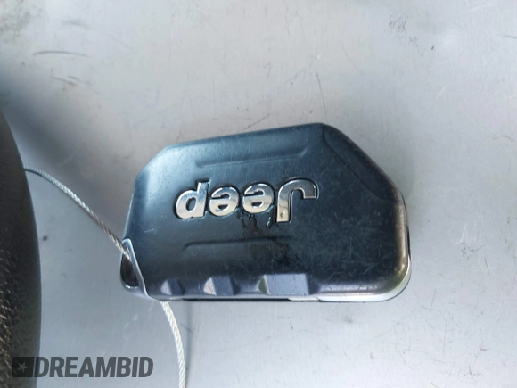 2021 Jeep Gladiator Willys with VIN 1C6HJTAGXML613431, listed as a IAAI auction lot 42180502 with 64,572 mi miles and . Bid and sale history available at DreamBid. Image 10.