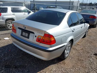 2003 BMW 3 Series 325i with VIN WBAAZ33443PH32847, listed as a IAAI auction lot 41754298 with 165,494 mi miles. Bid and sale history available at carsss.com. Image 4.