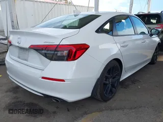 2022 Honda Civic Sport z VIN 2HGFE2F5XNH606629, wystawiony jako IAAI lot #41695647 z przebiegiem 58 128 mil mil oraz . Historia ofert i sprzedaży dostępna na DreamBid. Obrazek 4.