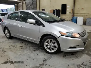 2010 Honda Insight EX with VIN JHMZE2H70AS037057, listed as a Copart auction lot 52704985 with 162,897 mi miles and Clean Title. Bid and sale history available at DreamBid. Image 4.