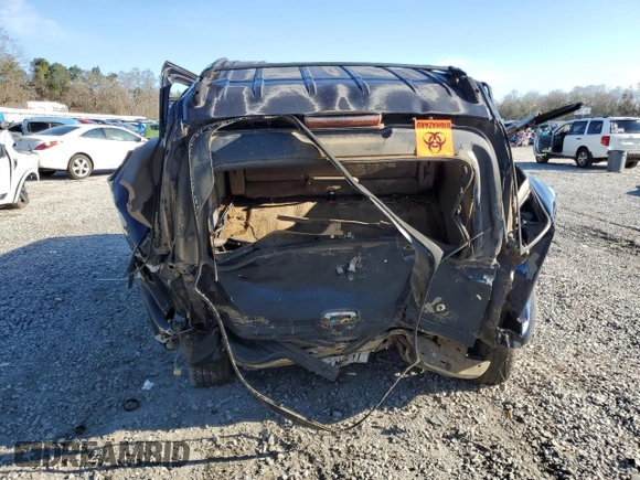 2004 GMC Yukon XL SLT with VIN 1GKEC16ZX4J107876, listed as a Copart auction lot 87132974 with 682,081 mi miles and Salvage Title. Bid and sale history available at carsss.com. Image 6.