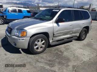2004 GMC Envoy SLE with VIN 1GKDS13S042391387, listed as a Copart auction lot 48059225 with 202,169 mi miles and Salvage Title. Bid and sale history available at carsss.com. Image 1.