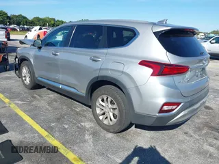 2020 Hyundai Santa Fe SEL with VIN 5NMS3CAD5LH218667, listed as a IAAI auction lot 41025347 with 81,632 mi miles and . Bid and sale history available at DreamBid. Image 3.
