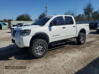 2013 Nissan Titan SL with VIN 1N6BA0EC2DN312206, listed as a Copart auction lot 44619385 with 144,719 mi miles and Salvage Title. Bid and sale history available at DreamBid. Image 1.
