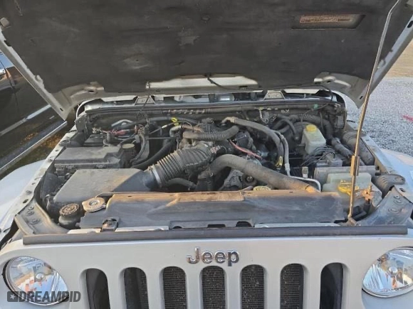 2011 Jeep Wrangler Unlimited Sahara with VIN 1J4BA5H16BL627992, listed as a Copart auction lot 54337305 with 197,845 mi miles and Clean Title. Bid and sale history available at carsss.com. Image 7.