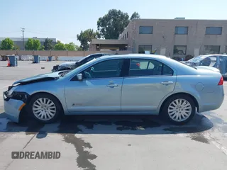 2010 Mercury Milan Hybrid with VIN 3MEDM0L35AR641477, listed as a IAAI auction lot 42443628 with 102,890 mi miles and . Bid and sale history available at DreamBid. Image 15.