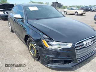 2014 Audi S6 Prestige z VIN WAUF2AFC9EN058417, wystawiony jako IAAI lot #42236333 z przebiegiem 58 257 mil mil oraz . Historia ofert i sprzedaży dostępna na DreamBid. Obrazek 6.