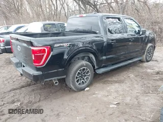 2023 Ford F-150 XL with VIN 1FTFW1E59PFA89187, listed as a IAAI auction lot 41064918 with 62,858 mi miles. Bid and sale history available at carsss.com. Image 4.