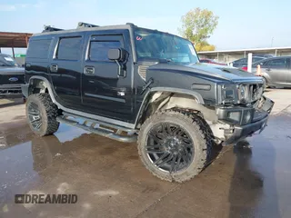 2003 Hummer H2 z VIN 5GRGN23UX3H112173, wystawiony jako IAAI lot #41093359 z przebiegiem Nie podano mil oraz . Historia ofert i sprzedaży dostępna na DreamBid. Obrazek 1.