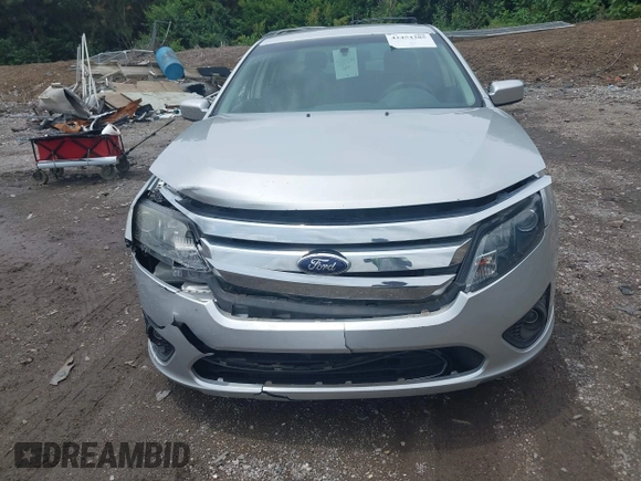 2012 Ford Fusion SE z VIN 3FAHP0HA3CR421636, wystawiony jako IAAI lot #42454385 z przebiegiem 138 282 mil mil oraz . Historia ofert i sprzedaży dostępna na DreamBid. Obrazek 6.