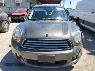 2014 MINI Countryman with VIN WMWZB3C54EWR39731, listed as a Copart auction lot 63635215 with 85,751 mi miles and Salvage title. Bid and sale history available at DreamBid. Image 5.