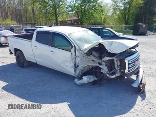 2019 GMC Canyon 4WD SLE z VIN 1GTG6CEN0K1353094, wystawiony jako IAAI lot #42065160 z przebiegiem 73 235 mil mil oraz . Historia ofert i sprzedaży dostępna na DreamBid. Obrazek 1.