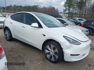2023 Tesla Model Y Long Range with VIN 7SAYGDEE2PF765395, listed as a IAAI auction lot 41688080 with 27,792 mi miles and . Bid and sale history available at DreamBid. Image 1.