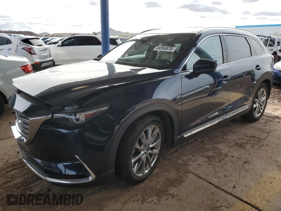 2018 Mazda CX-9 Grand Touring z VIN JM3TCADY2J0220873, wystawiony jako Copart lot #49264875 z przebiegiem Nie podano mil oraz Szkoda całkowita • Salvage title. Historia ofert i sprzedaży dostępna na DreamBid. Obrazek 1.
