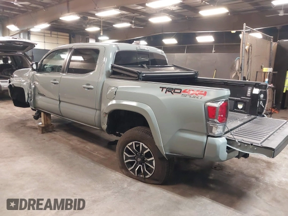 2023 Toyota Tacoma 4WD SR with VIN 3TMCZ5ANXPM607489, listed as a IAAI auction lot 41605018 with 15,229 mi miles. Bid and sale history available at carsss.com. Image 3.