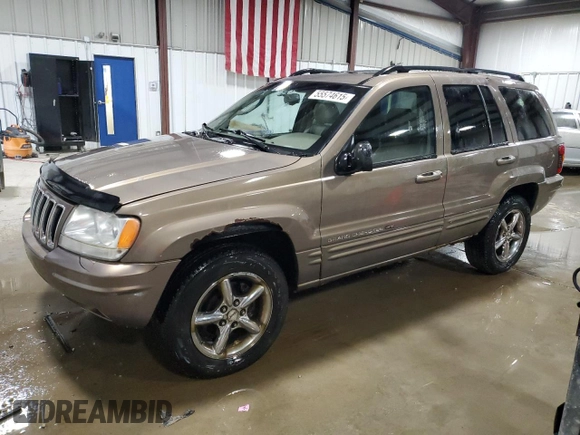 2002 Jeep Grand Cherokee Limited with VIN 1J4GW58NX2C248892, listed as a Copart auction lot 55574615 with 164,010 mi miles and Salvage title. Bid and sale history available at DreamBid. Image 1.