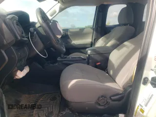 2023 Toyota Tacoma SR with VIN 3TYRX5GN2PT083718, listed as a Copart auction lot 49546035 with 23,005 mi miles and Salvage title. Bid and sale history available at DreamBid. Image 7.