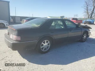 1996 Cadillac Seville Touring STS z VIN 1G6KY5299TU801228, wystawiony jako Copart lot #47304045 z przebiegiem Nie podano mil oraz Szkoda całkowita • Salvage title. Historia ofert i sprzedaży dostępna na DreamBid. Obrazek 3.