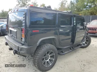 2003 Hummer H2 with VIN 5GRGN23U73H125110, listed as a Copart auction lot 75932244 with 0 mi miles and Salvage Title. Bid and sale history available at carsss.com. Image 3.
