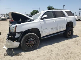 2020 GMC Yukon SLT with VIN 1GKS2BKC1LR268078, listed as a Copart auction lot 63642494 with 63,584 mi miles and Salvage Title. Bid and sale history available at carsss.com. Image 1.