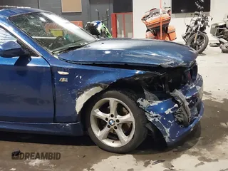 2010 BMW 1 Series 128i with VIN WBAUP9C57AVF49515, listed as a IAAI auction lot 41154745 with 120,982 mi miles and . Bid and sale history available at DreamBid. Image 6.