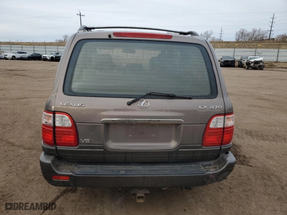 1999 Lexus LX 470 Luxury SUV with VIN JT6HT00WXX0052090, listed as a Copart auction lot 84533774 with NaN miles and Salvage Title. Bid and sale history available at carsss.com. Image 6.