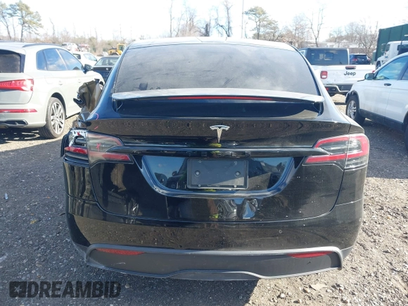 2023 Tesla Model X with VIN 7SAXCAE59PF377408, listed as a IAAI auction lot 41176738 with 32,496 mi miles and . Bid and sale history available at DreamBid. Image 16.