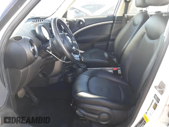 2015 MINI Countryman with VIN WMWZB3C53FWR45084, listed as a Copart auction lot 44647995 with 101,423 mi miles and Salvage Title. Bid and sale history available at DreamBid. Image 7.