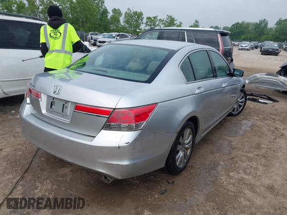 2011 Honda Accord EX with VIN 1HGCP2F79BA048703, listed as a IAAI auction lot 42425363 with 216,233 mi miles and . Bid and sale history available at DreamBid. Image 4.