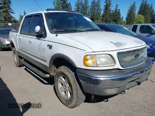 2001 Ford F-150 XLT with VIN 1FTRW08L21KC01442, listed as a IAAI auction lot 42163484 with 230,590 mi miles and . Bid and sale history available at DreamBid. Image 1.