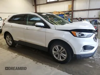2020 Ford Edge SEL with VIN 2FMPK4J92LBA64715, listed as a Copart auction lot 61615675 with 101,135 mi miles and Salvage title. Bid and sale history available at DreamBid. Image 4.