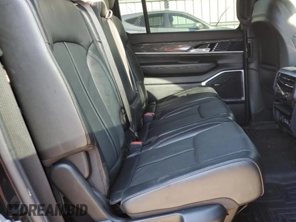 2022 Jeep Wagoneer Series II with VIN 1C4SJUBT2NS168092, listed as a Copart auction lot 47606775 with 61,695 mi miles and Salvage title. Bid and sale history available at DreamBid. Image 11.