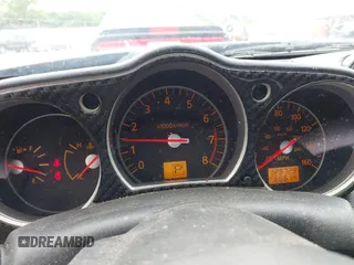 2006 Nissan 350Z Touring z VIN JN1AZ36A76M456514, wystawiony jako IAAI lot #42266616 z przebiegiem 129 729 mil mil oraz . Historia ofert i sprzedaży dostępna na DreamBid. Obrazek 7.