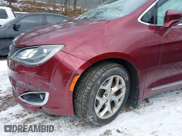 2017 Chrysler Pacifica Touring L Plus with VIN 2C4RC1EG6HR652908, listed as a IAAI auction lot 41381104 with 82,186 mi miles and . Bid and sale history available at DreamBid. Image 21.