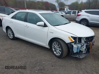 2012 Toyota Camry XLE z VIN 4T1BD1FK0CU003954, wystawiony jako IAAI lot #42066046 z przebiegiem 140 999 mil mil oraz . Historia ofert i sprzedaży dostępna na DreamBid. Obrazek 1.