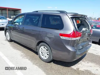 2012 Toyota Sienna XLE AAS with VIN 5TDYK3DC8CS263406, listed as a IAAI auction lot 41971770 with 186,394 mi miles. Bid and sale history available at carsss.com. Image 3.