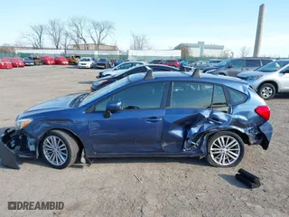 2012 Subaru Impreza Wagon 2.0i Premium with VIN JF1GPAF65CH208057, listed as a IAAI auction lot 41774058 with 93,335 mi miles. Bid and sale history available at carsss.com. Image 14.