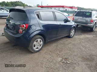 2015 Chevrolet Sonic LS with VIN 1G1JA6SG7F4214749, listed as a IAAI auction lot 42646414 with 141,879 mi miles and . Bid and sale history available at DreamBid. Image 4.