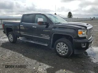 2017 GMC Sierra 2500HD Denali z VIN 1GT12UEY0HF114366, wystawiony jako Copart lot #54540275 z przebiegiem 78 066 mil mil oraz Szkoda całkowita • Salvage title. Historia ofert i sprzedaży dostępna na DreamBid. Obrazek 4.