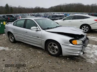 2001 Pontiac Grand Am GT1 with VIN 1G2NV52E31C236580, listed as a Copart auction lot 83085894 with 114,381 mi miles and Salvage Title. Bid and sale history available at carsss.com. Image 4.