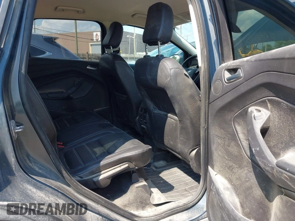2019 Ford Escape Titanium with VIN 1FMCU9J99KUC00935, listed as a IAAI auction lot 42583250 with 91,241 mi miles and . Bid and sale history available at DreamBid. Image 8.