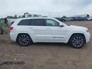 2017 Jeep Grand Cherokee Overland with VIN 1C4RJFCG6HC941771, listed as a IAAI auction lot 42356577 with 192,318 mi miles and . Bid and sale history available at DreamBid. Image 13.