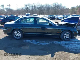 2005 Jaguar S-Type with VIN SAJWA01T95FN51551, listed as a IAAI auction lot 41637854 with 90,075 mi miles and . Bid and sale history available at DreamBid. Image 13.