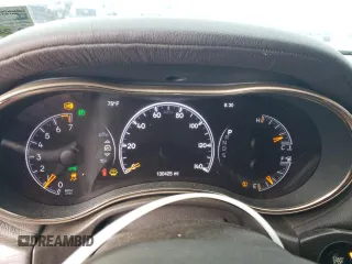 2015 Jeep Grand Cherokee Summit with VIN 1C4RJEJG8FC131925, listed as a Copart auction lot 55270785 with 130,425 mi miles and Salvage title. Bid and sale history available at DreamBid. Image 9.