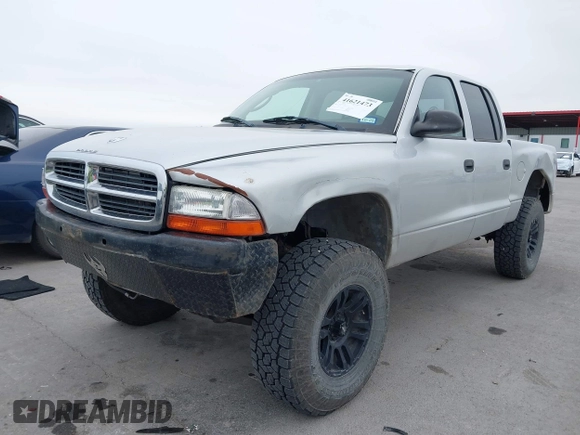 2004 Dodge Dakota Sport with VIN 1D7HG38NX4S608298, listed as a IAAI auction lot 41621473 with 192,876 mi miles. Bid and sale history available at carsss.com. Image 2.