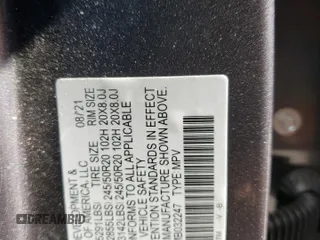 2021 Honda Passport EX-L z VIN 5FNYF8H56MB032247, wystawiony jako Copart lot #54862895 z przebiegiem 64 941 mil mil oraz Szkoda całkowita • Salvage title. Historia ofert i sprzedaży dostępna na DreamBid. Obrazek 13.